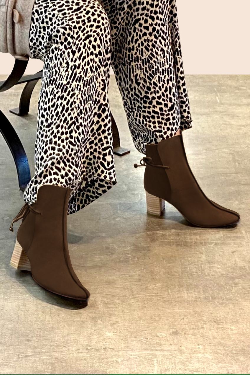 Dark brown women's ankle boots with laces at the back. Square toe. Medium block heels. Worn view - Florence KOOIJMAN